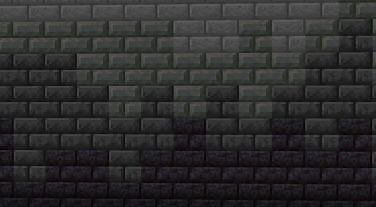 دیوار سنگی با شیب رنگی روشن که به سمت تاریکی پیش رفته است.